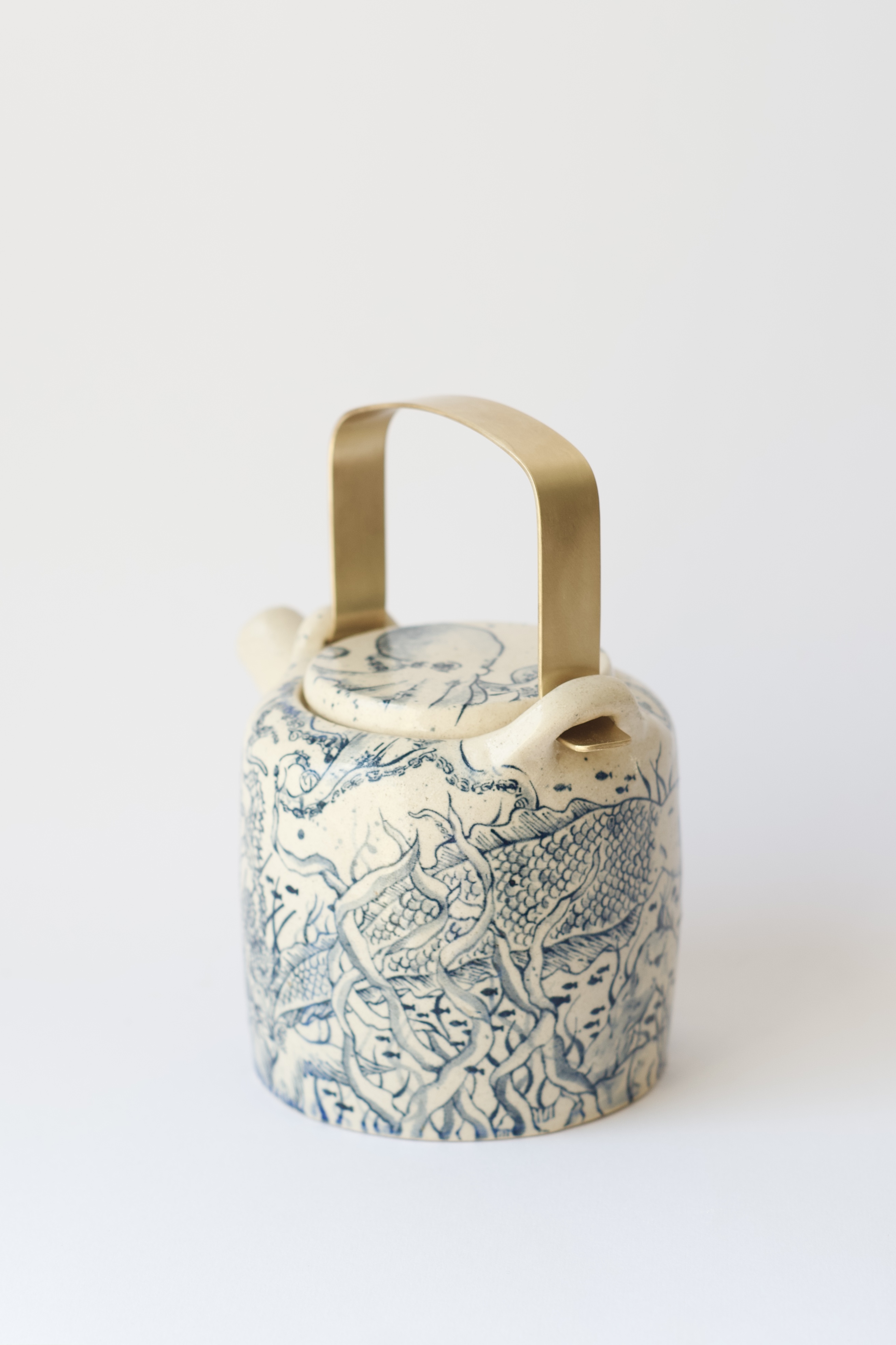 Teapot with a mermaid 