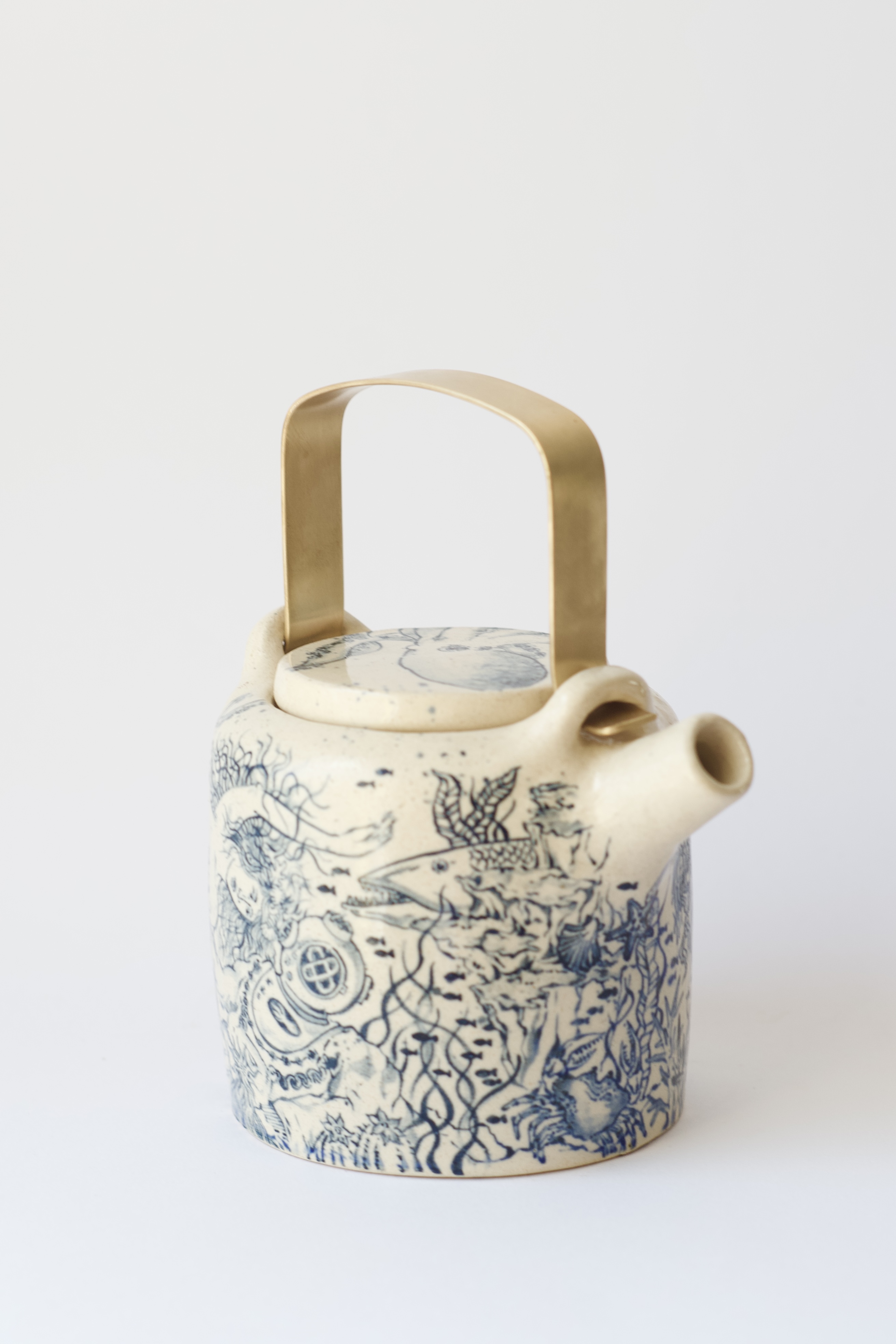 Teapot with a mermaid 
