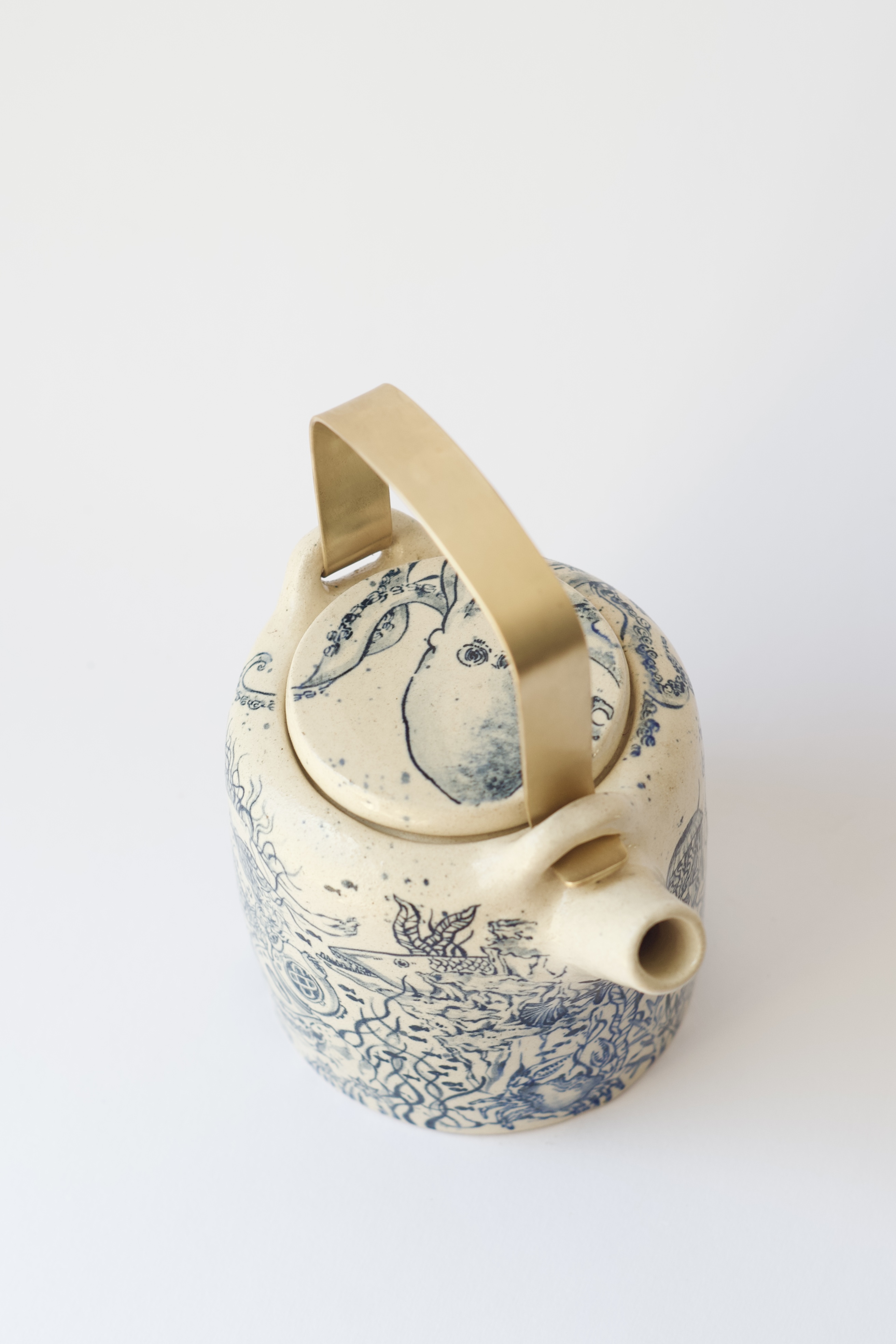 Teapot with a mermaid 