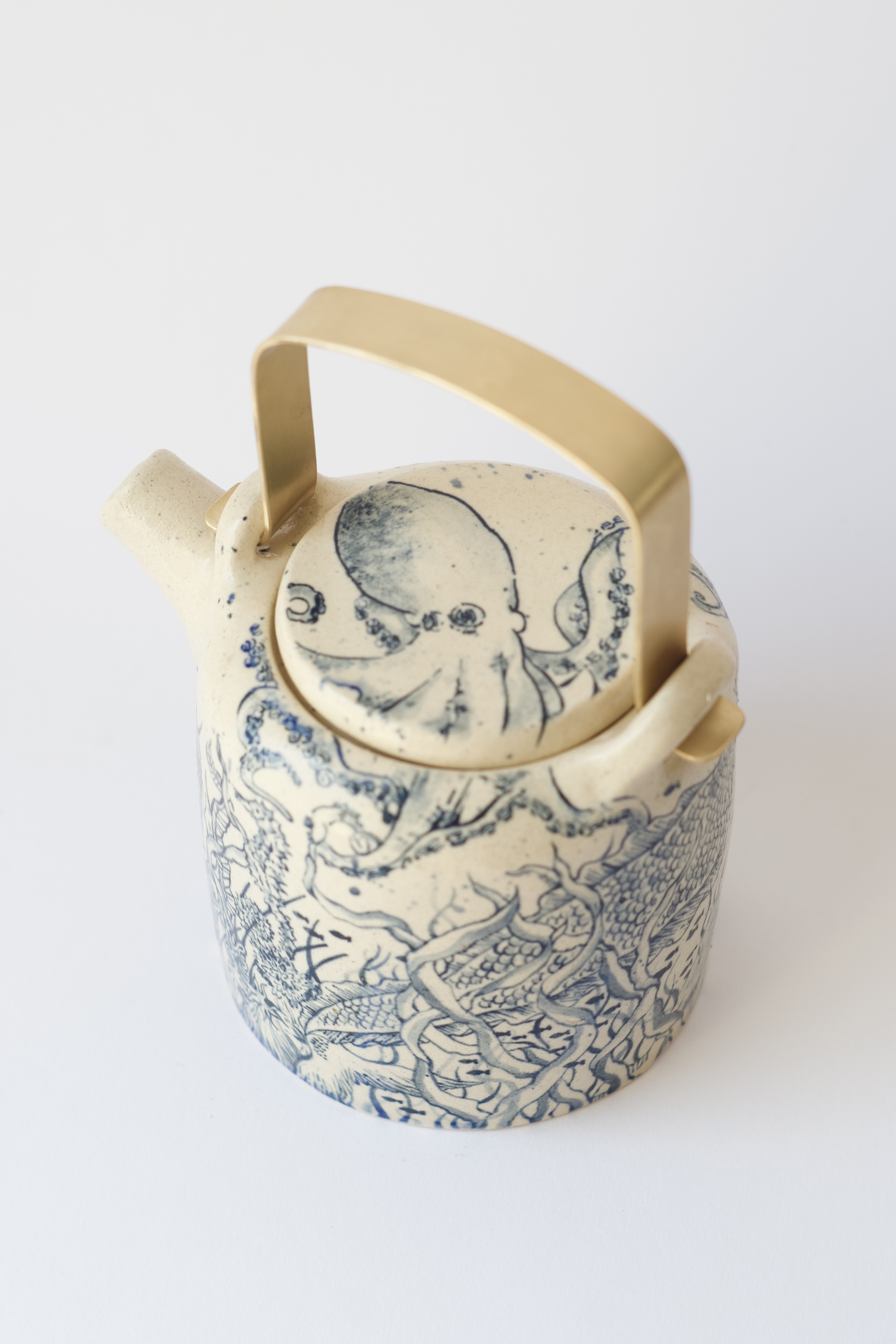 Teapot with a mermaid 