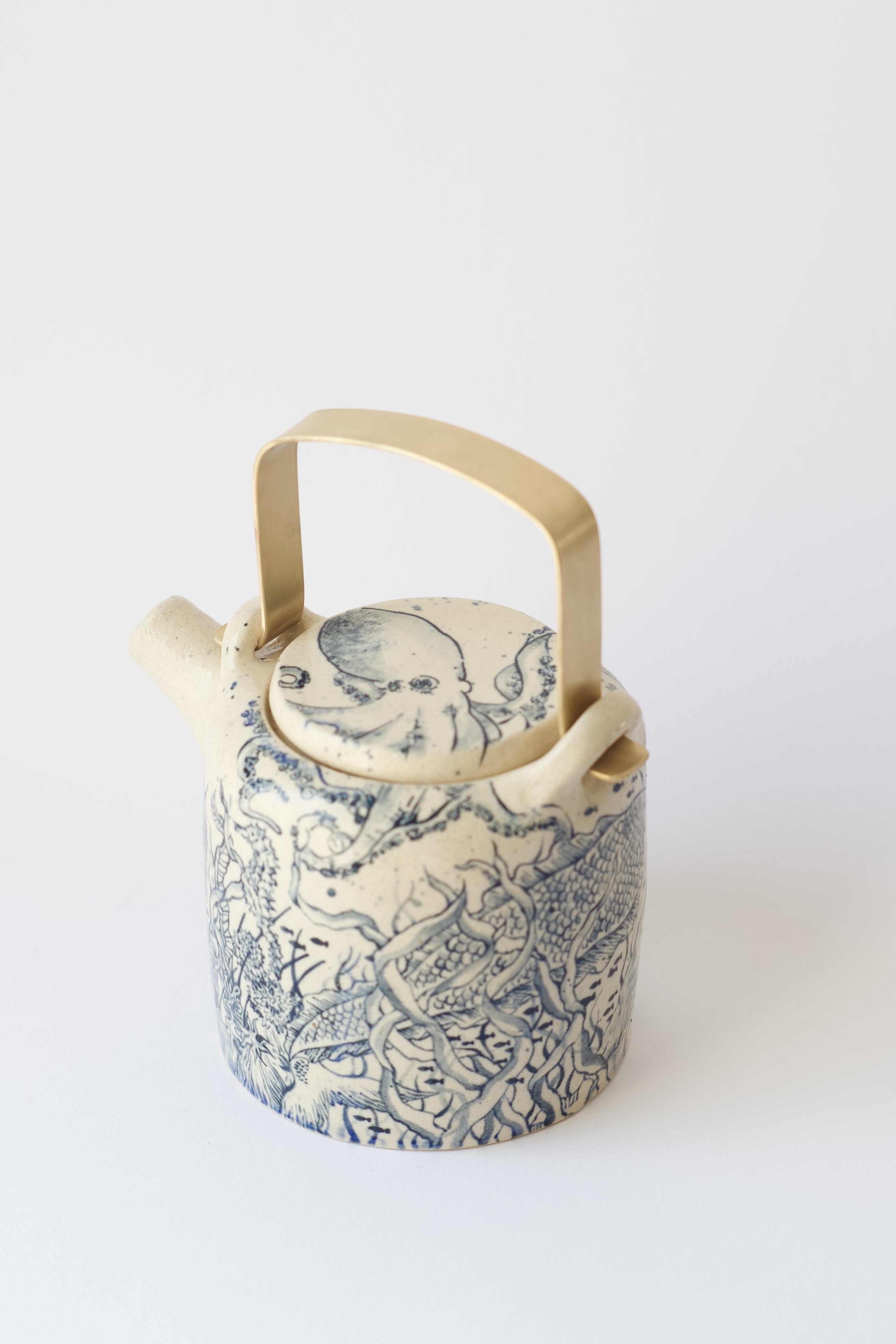 Teapot with a mermaid 